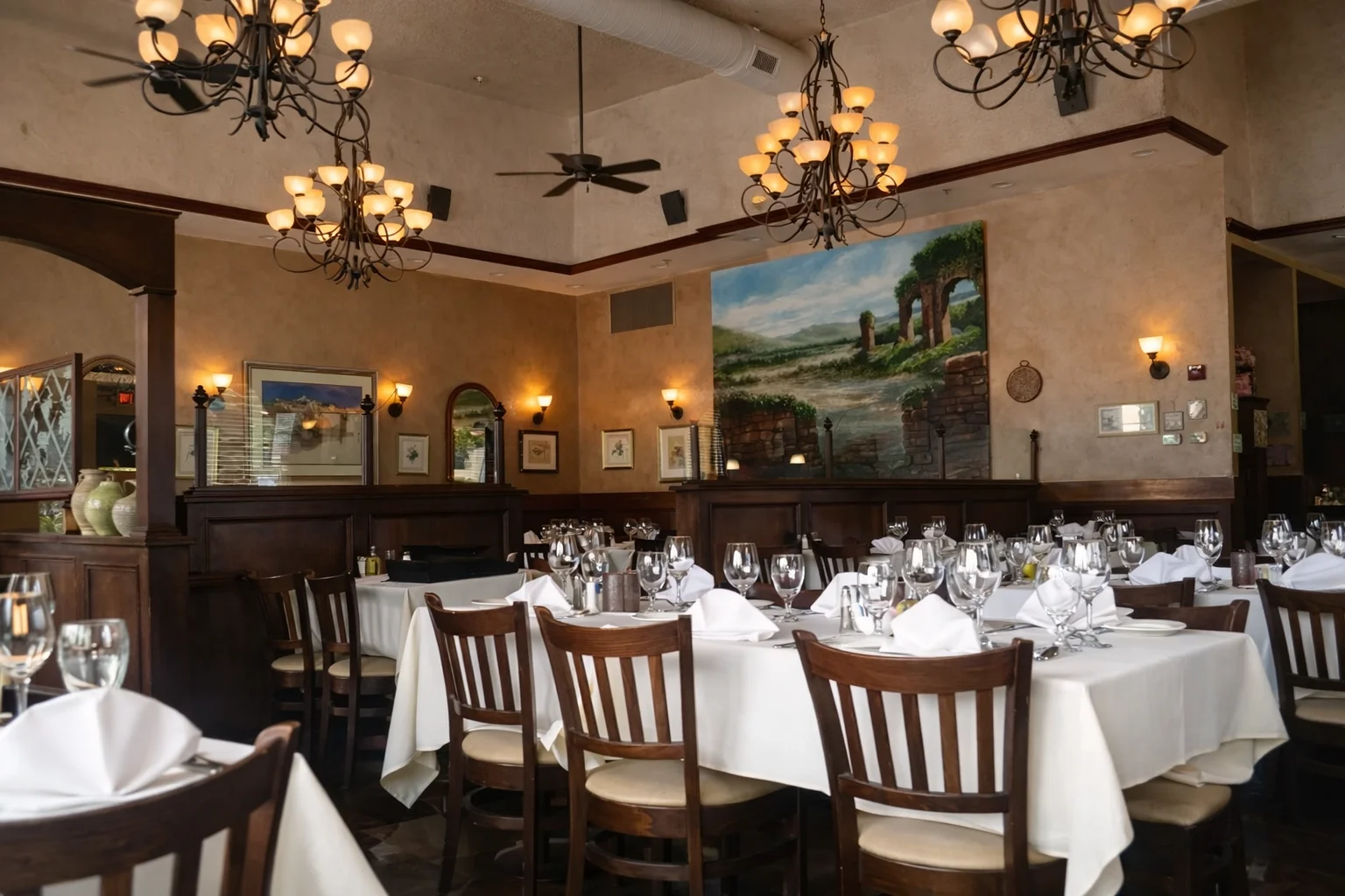 Dining room with tables set for evening service